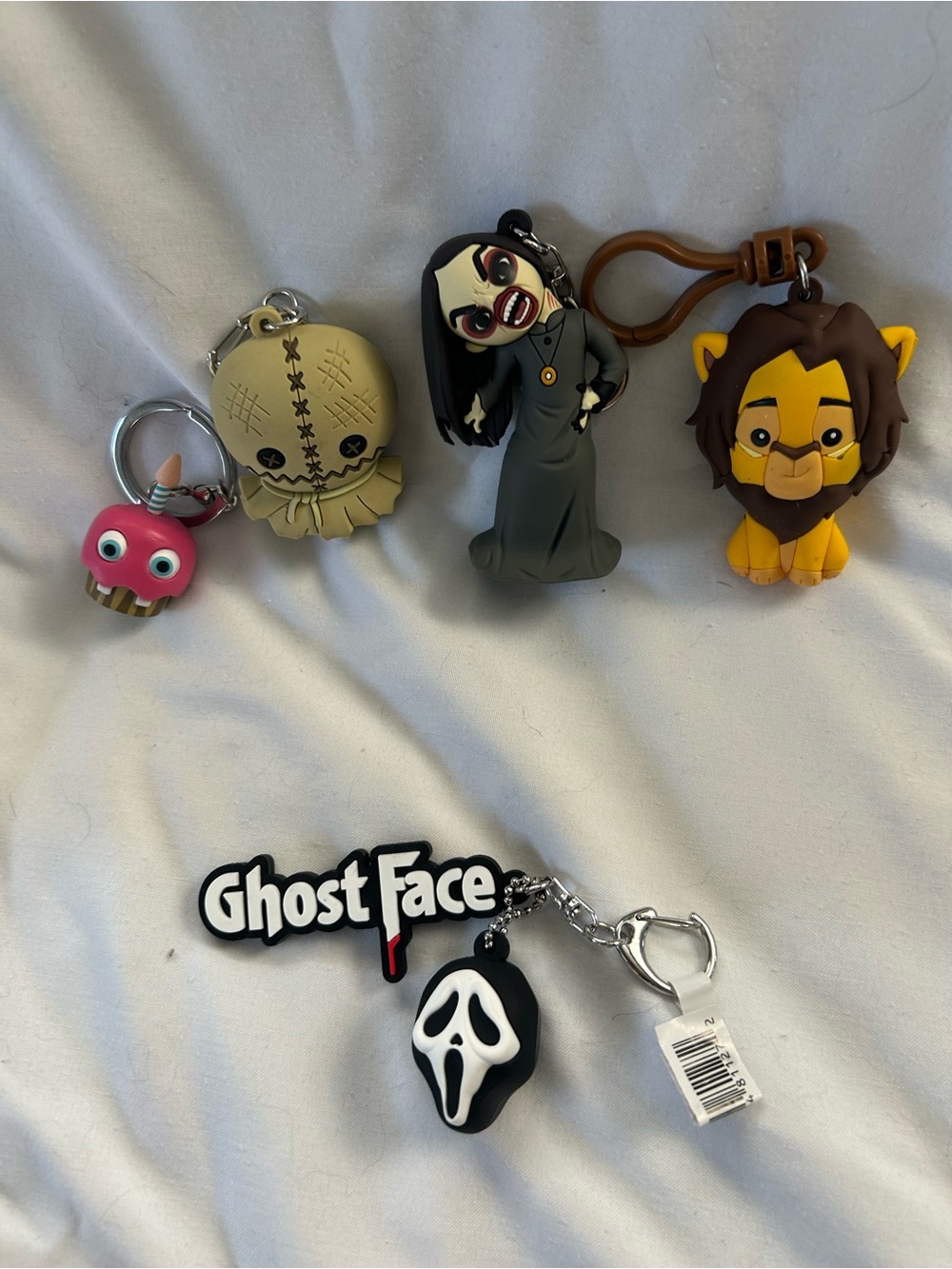 Funko Keychain lot of 5. 4 Horror Movie Theme and one Disney Lion King